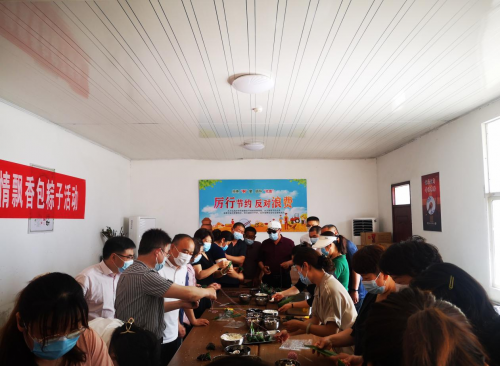 悠悠艾草香，濃濃端午情——商水縣煙草專賣局開展包粽子迎端午活動